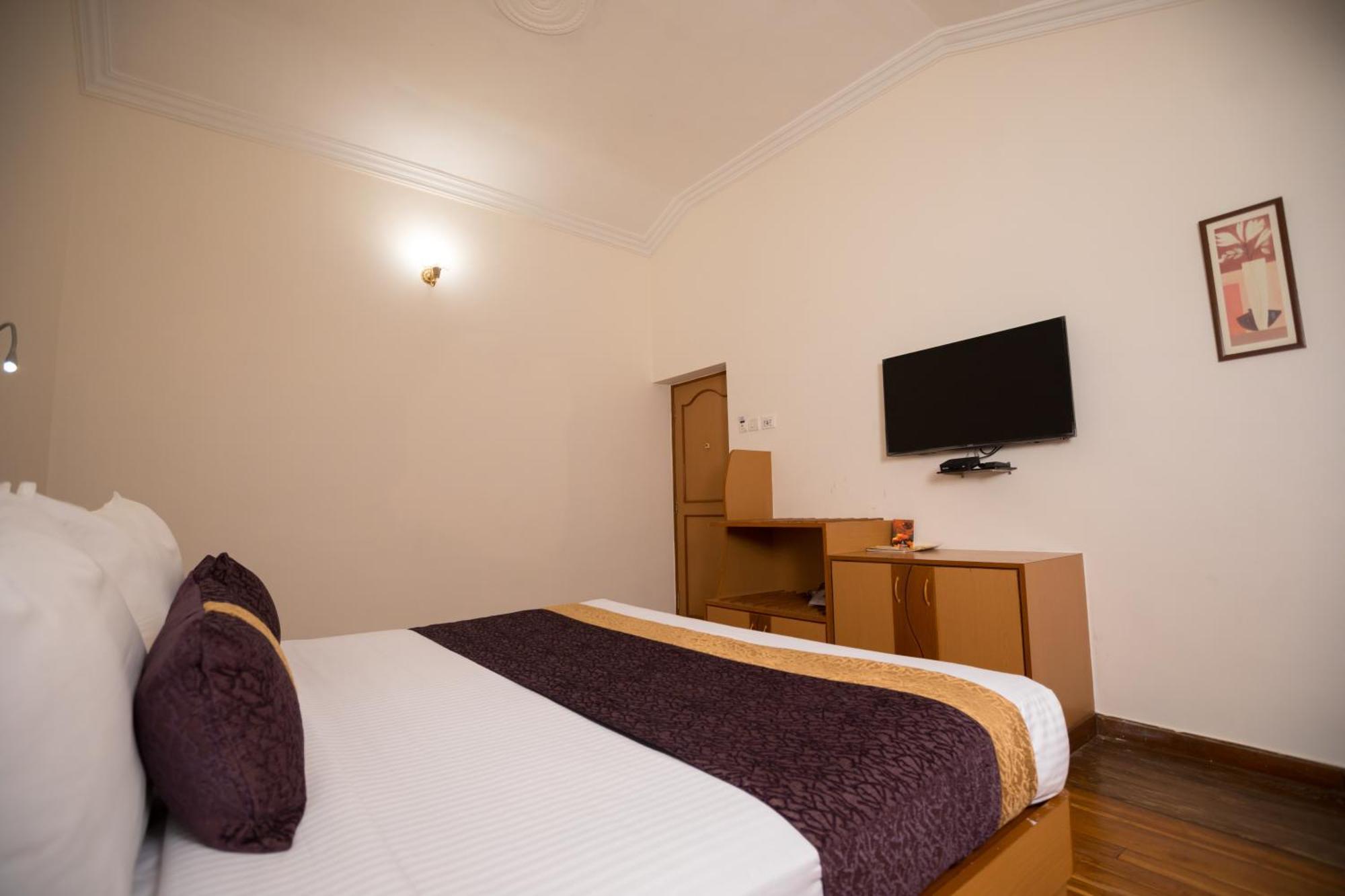 Hotel Kodai International Kodaikanal Kamer foto